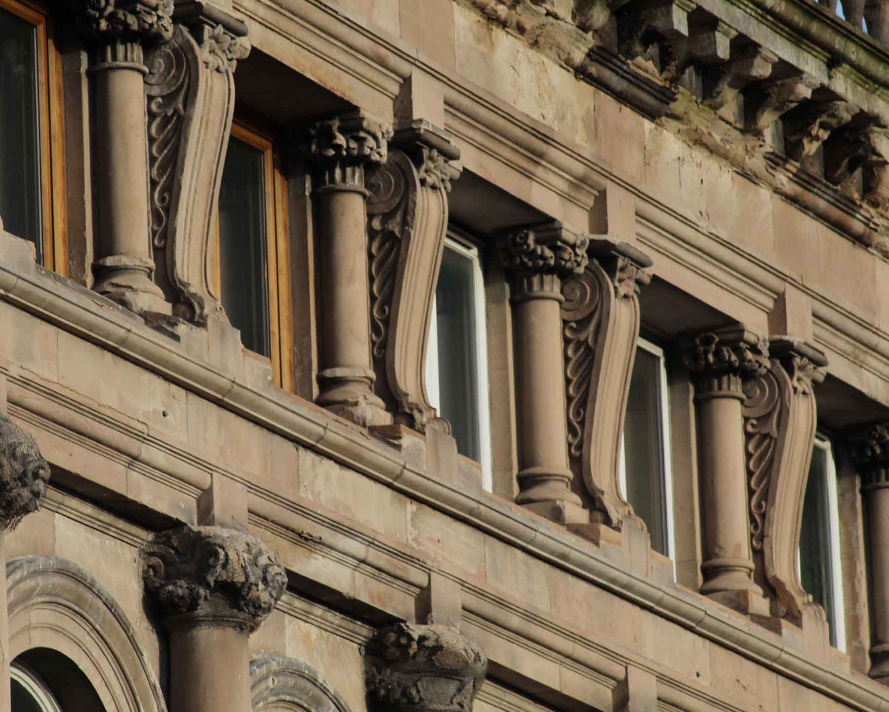 Mackintosh buildings detailed view of stone carving on facade