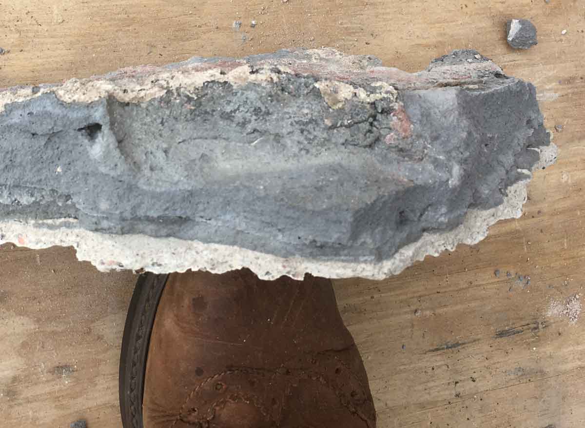 Examination of cement harling removed from traditional stone wall